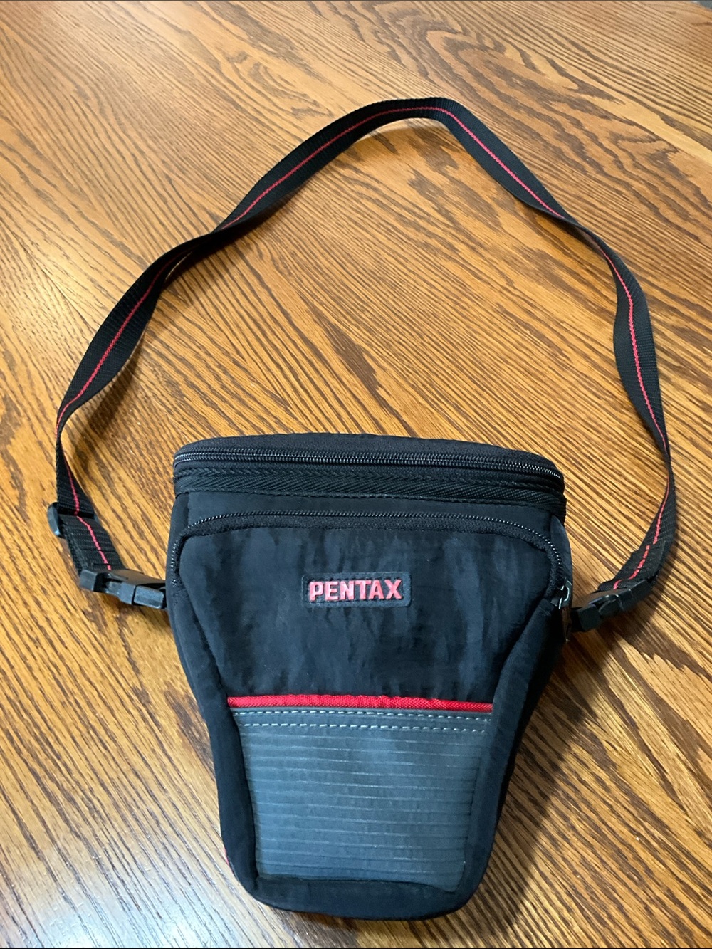 Genuine Pentax Camera Bag with two Zippered Compartments with Shoulder Strap.